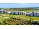 Aerial view of condo buildings and golf course at 12180 Wellen Golf St # 302, Venice, FL 34293