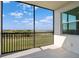 This screened balcony features stunning golf course views and serene outdoor living at 12180 Wellen Golf St # 302, Venice, FL 34293