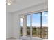 View from covered balcony through railing of trees, sky, and foliage at 12180 Wellen Golf St # 302, Venice, FL 34293