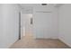 Bedroom with neutral carpet, adjacent to a closet and bathroom, adding privacy at 12180 Wellen Golf St # 302, Venice, FL 34293