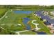 Scenic aerial view of the golf course with ponds and lush landscaping at 12180 Wellen Golf St # 302, Venice, FL 34293