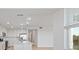 Modern kitchen with stainless appliances, an island, and white cabinetry at 12180 Wellen Golf St # 302, Venice, FL 34293