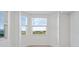 Bright living space with many windows offering natural light and a peaceful view at 12180 Wellen Golf St # 302, Venice, FL 34293