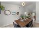 Dining area with modern lighting, decor and view of the living room at 13600 N Branch Rd, Sarasota, FL 34240