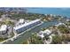 High angle view of apartment complex and surrounding neighborhood on a waterfront with easy boating access at 1709 N Tamiami Trl # 422, Sarasota, FL 34234