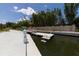 Picturesque community waterfront access with kayak storage and a beautiful water view at 1709 N Tamiami Trl # 422, Sarasota, FL 34234