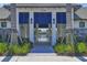 The clubhouse entrance has blue awning and allows you to view the pool at 17842 Cherished Loop, Bradenton, FL 34211