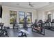 Well-equipped gym with weights, machines, and natural light at 17842 Cherished Loop, Bradenton, FL 34211