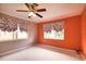 Bedroom with carpet, ceiling fan, and large windows at 221 Laurel E Rd, Nokomis, FL 34275