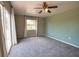 Bedroom featuring ceiling fan, lake view, and carpet at 221 Laurel E Rd, Nokomis, FL 34275