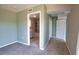 Bedroom leading into bathroom with tile shower and vanity at 221 Laurel E Rd, Nokomis, FL 34275