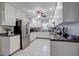 Bright kitchen with white cabinets, modern appliances, and a functional layout for cooking at 2412 Grove St, Sarasota, FL 34239