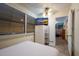 Inviting bedroom with serene decor, plush bedding, and closet space for comfortable living at 313 Magnolia Ave, Anna Maria, FL 34216
