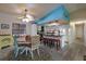 Charming kitchen and dining area with modern appliances, a breakfast bar, and a cozy atmosphere for Gathering meals at 313 Magnolia Ave, Anna Maria, FL 34216
