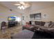 Comfortable living room boasts a spacious sectional, neutral tones, and a welcoming atmosphere for relaxing or entertaining guests at 313 Magnolia Ave, Anna Maria, FL 34216