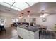 Bright and airy open-concept living space combining kitchen, dining, and living areas, ideal for modern living and entertaining at 313 Magnolia Ave, Anna Maria, FL 34216