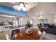 Open-concept living area featuring a modern kitchen, comfortable seating, and stylish decor at 313 Magnolia Ave, Anna Maria, FL 34216