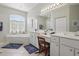 Bright bathroom featuring a soaking tub, vanity with double sinks, and a separate shower at 3218 45Th E Way, Bradenton, FL 34203