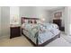 Relaxing main bedroom featuring a comfortable bed, soft lighting, and stylish decor at 3218 45Th E Way, Bradenton, FL 34203