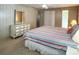 Bedroom with a ceiling fan, carpet, and built in closet space at 3232 Ash Ter, Sarasota, FL 34237