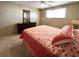 Bedroom showcasing a double bed, dresser with mirror, and a window, providing a cozy retreat at 3232 Ash Ter, Sarasota, FL 34237