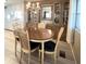 Dining room features a chandelier and beautiful built in cabinetry at 3232 Ash Ter, Sarasota, FL 34237