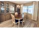 Dining area with a chandelier and a built in china cabinet at 3232 Ash Ter, Sarasota, FL 34237