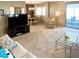 Spacious living room offering a view of the adjacent dining area and lanai at 3232 Ash Ter, Sarasota, FL 34237
