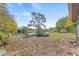 Backyard with pond view, landscaping and brickwork at 3503 67Th W St, Bradenton, FL 34209