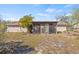 Cozy screened lanai in the backyard with a palm tree and ample space for outdoor enjoyment at 3503 67Th W St, Bradenton, FL 34209