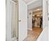 Bathroom featuring a shower, and a view into a walk-in closet for ample storage at 3503 67Th W St, Bradenton, FL 34209