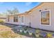 Close up shot of a one story home with a well-lit driveway and front yard at 3503 67Th W St, Bradenton, FL 34209