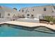 Gorgeous backyard featuring a pool, brick surround, and a multi-tiered deck perfect for entertaining at 3648 Beneva Oaks Blvd, Sarasota, FL 34238