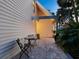 Cozy outdoor patio with a bistro set, perfect for enjoying quiet moments outside the home at 3648 Beneva Oaks Blvd, Sarasota, FL 34238