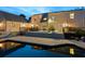 Backyard pool and deck area, showcasing a relaxing outdoor space with a water feature and ample room for lounging at 3648 Beneva Oaks Blvd, Sarasota, FL 34238