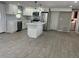 Beautiful remodeled kitchen boasts quartz counters, stainless appliances and white cabinets, all new and ready to be enjoyed! at 3826 Clover Ln, Sarasota, FL 34233