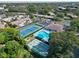 Community featuring a tennis court, a pool, shuffleboard courts and mature landscaping at 390 301 W Blvd # 13A, Bradenton, FL 34205