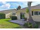 Well-maintained backyard with a cozy patio, ideal for outdoor seating, and plenty of green space at 390 301 W Blvd # 13A, Bradenton, FL 34205