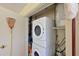 Efficient laundry area with stacked washer and dryer, maximizing space and convenience at 390 301 W Blvd # 13A, Bradenton, FL 34205