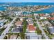 Expansive aerial view of a coastal community, highlighting the marinas and waterfront properties at 412 Pheasant Way, Sarasota, FL 34236