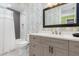 Stylish bathroom offers a shower/tub, and a modern vanity with ample storage space at 412 Pheasant Way, Sarasota, FL 34236