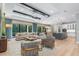 Spacious living room that opens to the kitchen, with ample seating, and contemporary finishes at 412 Pheasant Way, Sarasota, FL 34236