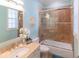 Bathroom with a shower and tub combination, and stylish vanity at 449 Canal Rd # 449, Sarasota, FL 34242