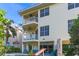 Exterior view of home featuring multiple balconies and poolside patio at 449 Canal Rd # 449, Sarasota, FL 34242