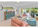 Cozy living room with beach-themed decorations and patio access at 449 Canal Rd # 449, Sarasota, FL 34242