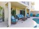 Inviting outdoor patio with comfortable seating and poolside access at 449 Canal Rd # 449, Sarasota, FL 34242