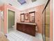 Bathroom features double vanity, skylight, and a glass-enclosed shower at 4534 La Jolla Dr, Bradenton, FL 34210