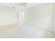 Bright bedroom with white walls, carpet, a ceiling fan and plenty of natural light at 4534 La Jolla Dr, Bradenton, FL 34210