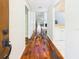 Inviting entryway showcasing beautiful hardwood floors and a glimpse of the living spaces at 4534 La Jolla Dr, Bradenton, FL 34210