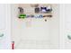 Bright laundry area includes wire shelving for ample storage of supplies at 4534 La Jolla Dr, Bradenton, FL 34210